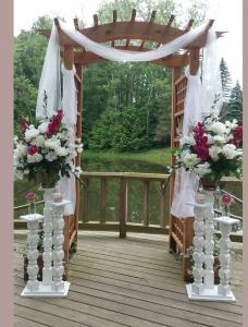 Arbor Draped with White Rental Spindles